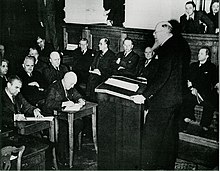 Danish Prime Minister Thorvald Stauning addresses the Rigsdagen in Christiansborg Palace on the day of the invasion. Statsminister Th. Stauning (6045175779) (2).jpg