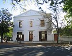 The original portion of this building dates from the middle of the 18th century. It is now a typical example of a double-storeyed town house. The best known owner of the property was Prof. John Murray, one of the first two professors at the Theological Seminary.