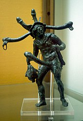 Polyphallic bronze tintinnabulum; the tip of each phallus was outfitted with a ring to dangle a bell Bronze ithyphallic figurine with a head of phalluses.jpg
