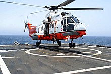 Hong Kong GFS AS332 L2 Super Puma SAR helicopter GFS Super Puma on USS Mobile Bay.jpg