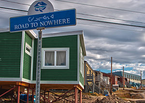 Green house on stilts in Iqaluit