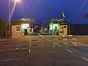 The pedestrian border crossing between Veľké Slemence, Slovakia and Mali Selmentsi, Ukraine as seen from Ukrainian side of the border, June 2017, night time.