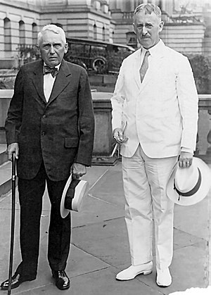 Secretary of State Henry L. Stimson (right) an...