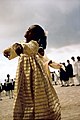 Girl in a golden dress at a festival. Baghdad, Iraq, 1970