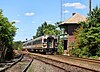 An NJ Transit train passes the closed WINSLOW tower at Winslow Junction, just north of Hammonton, New Jersey, in 2008