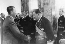 Estonian Defence Minister Nikolai Reek congratulating Hitler Nikolai Reek and Adolf Hitler.jpg