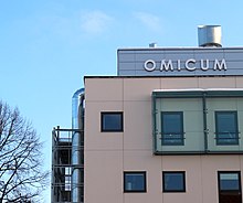 "Omicum": Building of the Estonian Biocentre which houses the Estonian Genome Centre and Institute of Molecular and Cell Biology at the University of Tartu in Tartu, Estonia. Omicum.jpg
