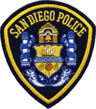 Patch of the SDPD. Introduced in 1988, these patches were originally brown to match the tan uniforms of the time, before being changed to blue in 1998.