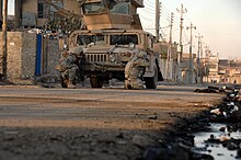 Street fighting in Mosul in January 2008 Street fighting Mosul.jpg