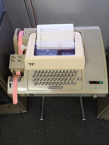 Teletype 33 Automatic Send and Receive teleprinter with paper tape in both the reader and the punch Teletype 33 ASR.jpg