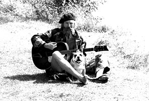 Stanshall with his bulldog Bones on a towpath in Shepperton, England, 1980