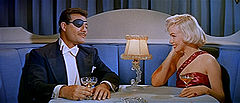 Alexander D'Arcy a Marilyn Monroe ve filmu Jak si vzít milionáře