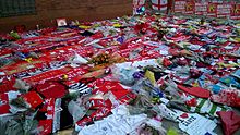 Football scarves and shirts were laid as a tribute outside Bescot Stadium, home of Walsall F.C., the team which three of the British victims supported. BescotMemorial.jpg