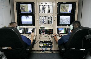 English: CBP Air and Marine officers control a...