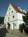 Sogenanntes Frauenhaus, ehemaliger Zehentstadel der Wallfahrtskirche in Kirchhaslach