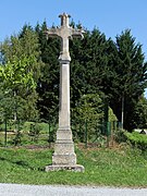 Croix monumentale à l'entrée sud-est du village de la Rouquette.
