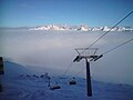 Nebelmeer unter Piz Martegnas. Im Hintergrund die Bergüner Stöcke mit Piz Mitgel, Tinzenhorn und Piz Ela