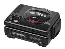Un Sega CD acoplado a una Sega Genesis.