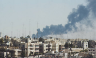 Smoke rises above Amman during Black September