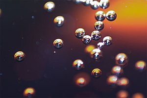 Macro photograph of coca-cola bubbles.