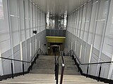 Staircase from platform to concourse at Preston, September 2022