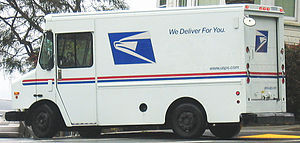 USPS service delivery truck in a residential a...