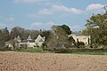 Château de Trémoar Façades et toitures du château, de la porterie, des communs et de la tour isolée Pigeonnier, puits de la cour d'honneur