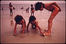 Children at a Brooklyn beach, 1974, Danny Lyon