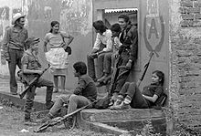 Men and Women both participated in revolutions that presented Revolutionary Feminism. These soldiers are fighting in the civil war in El Salvador. ERP combatants Perquin 1990 24.jpg