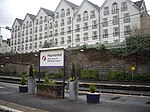 Haymarket Terrace, Haymarket Station Entrance And Office Block With Steps, Railings, And Lamp Standard