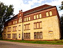 Stadtkaserne Perleberg, bestehend aus Garnisonslazarett, Villa, „Selbiger‘s Pferdestall“ mit Erweiterung, „Selbiger‘s Kasernement“, Stabsgebäude, Kammergebäude, Abteilungskaserne, zwei Wirtschaftsgebäuden, Geschützschuppen I, Krankenstall, Familienwohnhaus, Einfache Batteriekaserne, Doppelte Batteriekaserne und Batterie-Pferdestall (Doppelbatteriestall) sowie Einfriedungen, Steinpflasterungen und Gehölzbestand