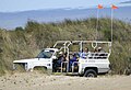 Oregon Governor returns from viewing the New Carissa disassembly. Kulongoski is sitting behind the driver in a blue jacket and blue cap. Before leaving he provided a few statements in an interview with the local media (Matt Jarvis).