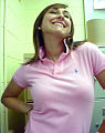 Image 95Woman wearing a polo shirt with a popped collar. (from 1990s in fashion)