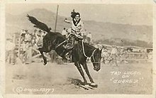 Tad-Lucas-Rodeo-Cowgirl-on-Bronco-c1920s-Doubleday-RPPC.jpg