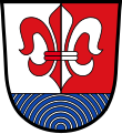 Gemeinde Amberg Über blauem Schildfuß, darin konzentrische, silberne Kreisbögen (Radiowellen), gespalten von Silber und Rot, belegt mit einer heraldischen Lilie in verwechselten Farben.