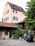 Ancien château (XVe, XVIe-XIXe), actuellement ferme, 6 place de l'Église.