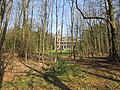 Landgoed Zonheuvel. Zichtbaar tussen de bomen: westgevel Maarten Maartenshuis.