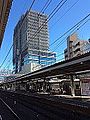 笹塚一丁目、2015年春開業の地上21階建「メルクマール京王笹塚」ビル（2014年12月13日撮影）
