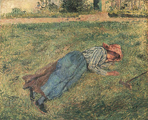 Im Gras liegendes Mädchen, Ölgemälde von Camille Pissarro