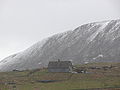 House in Easter Quarff, with Scrae Field behind