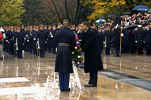 President Barack Obama lays a wreath at the To...