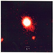 This view, taken with infrared light, is a false-color image of a quasar-starburst tandem with the most luminous starburst ever seen in such a combination.