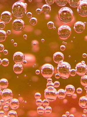 Bubbles of rose sparkling wine.