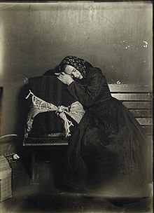 Exhausted Slavic immigrant, 1907. Slavic immigrant at Ellis Island, 1907.jpg