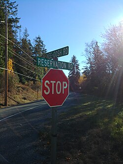 Stop sign at the intersection of Snee-Oosh Road and Reservation Road