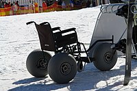 A snow wheelchair at an outdoor park