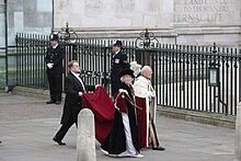 6 May 2023: Lord Carrington (Lord Great Chamberlain since 2022) on his way to the Coronation of King Charles III and Queen Camilla (with Baroness Manningham-Buller, LG). The King's Coronation (52875339738).jpg