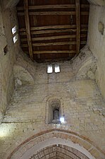Vue intérieur du clocher avec le passage des cloches.