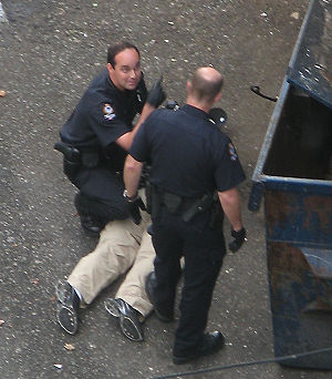 Vancouver police taking down a perp in the Dow...