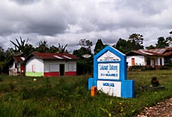 Gapura selamat datang di Desa Naga Saribu I